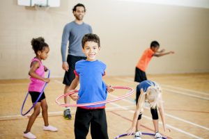 Group of Children Hula Hooping